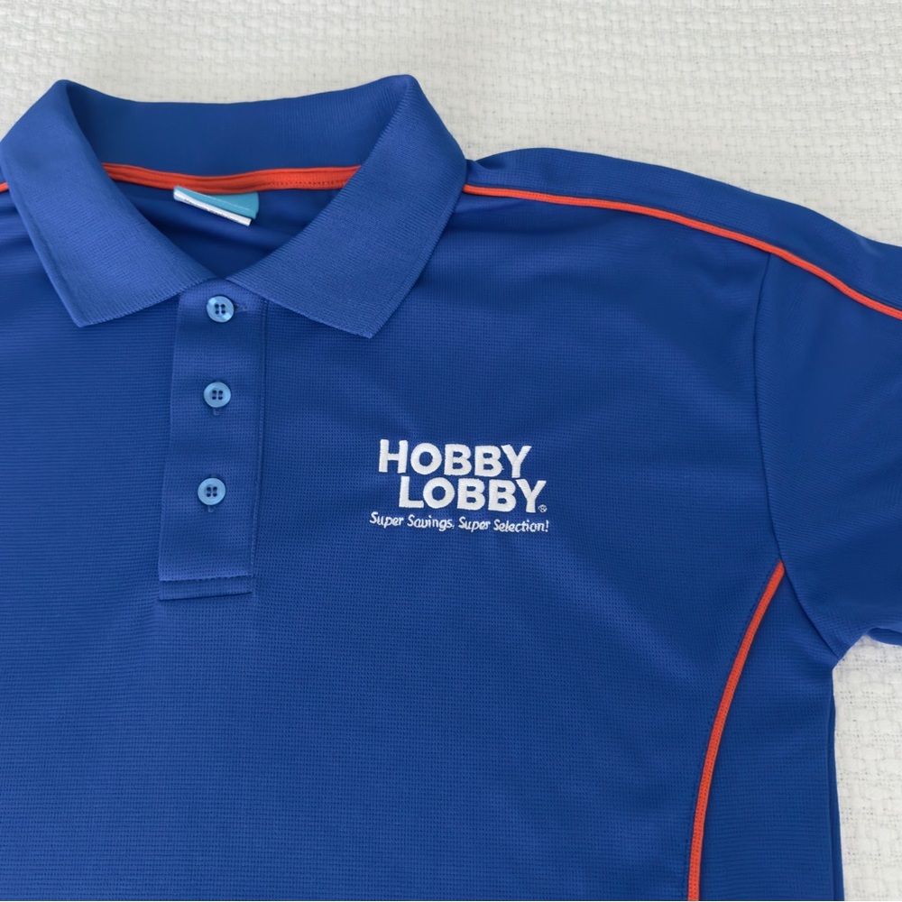 🆕 Hobby Lobby blue polo work shirt, unisex small
